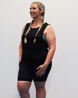 Active mother wearing high waisted maternity bikes shorts with pockets