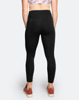 back view of best high waisted tights in black