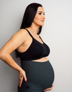 larger busted woman wears a wireless sports bra featuring moulded cups for maximum support