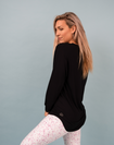 Side view of active mum wearing maternity activewear