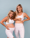 two mums wearing the maya bra, short and legging collection 