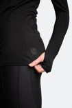 active mum withe brown hair wearing a black maternity top with long sleeves back view