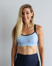 Active mother wearing maternity activewear bra