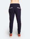 back view of active mum wearing navy blue with white floral trim lounge pants