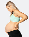 pregnant woman wearing a colourful racerback nursing bra