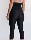 Back view of high waisted 3/4 maternity leggings with pockets