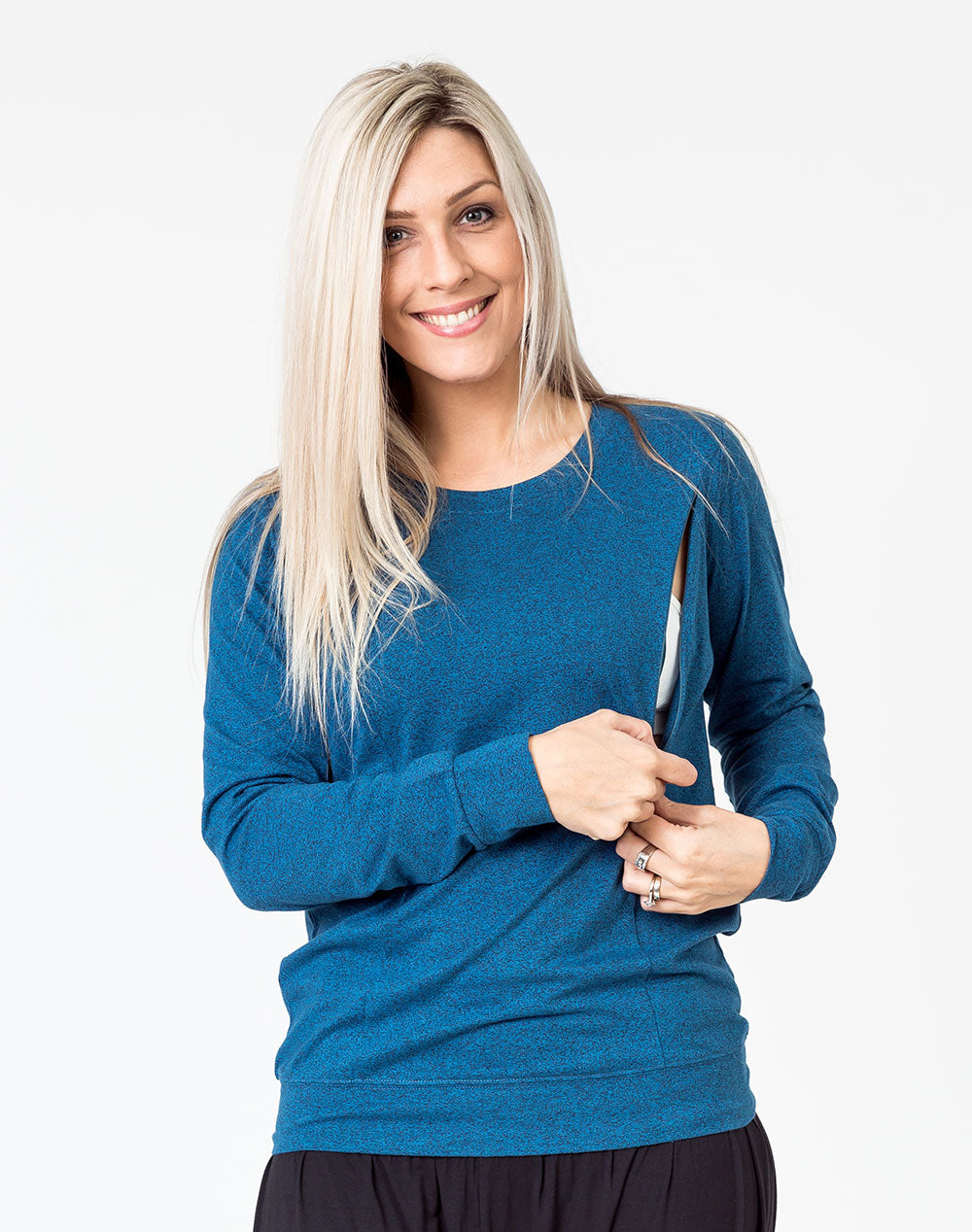 active mum wearing a navy maternity top with long sleeves and invisible zips for breastfeeding