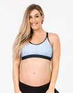 pregnant mother wearing nursing sports bra in confetti print