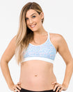 front view of a mum wearing a white breastfeeding sports bra 
