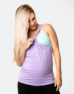 Pregnant mother showing nursing function of breastfeeding tank
