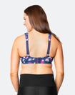 back view of active woman wearing a nursing sports bra