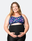Pregnant mother wearing floral nursing sports bra